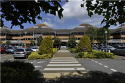 Front entrance of Weston General Hospital surrounded by trees