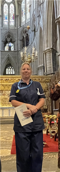 Sister Claire Pike stood in Westminster Abbey