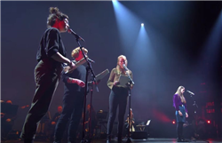Beth Roberts, Beth Calverley and Tamsin perform 'Listen In' alongside singers 