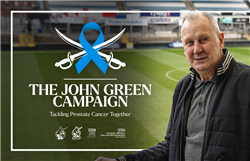 The John Green Campaign. Tackling prostate cancer together. Next to the text is an image of John Green at the Bristol Rovers football stadium.